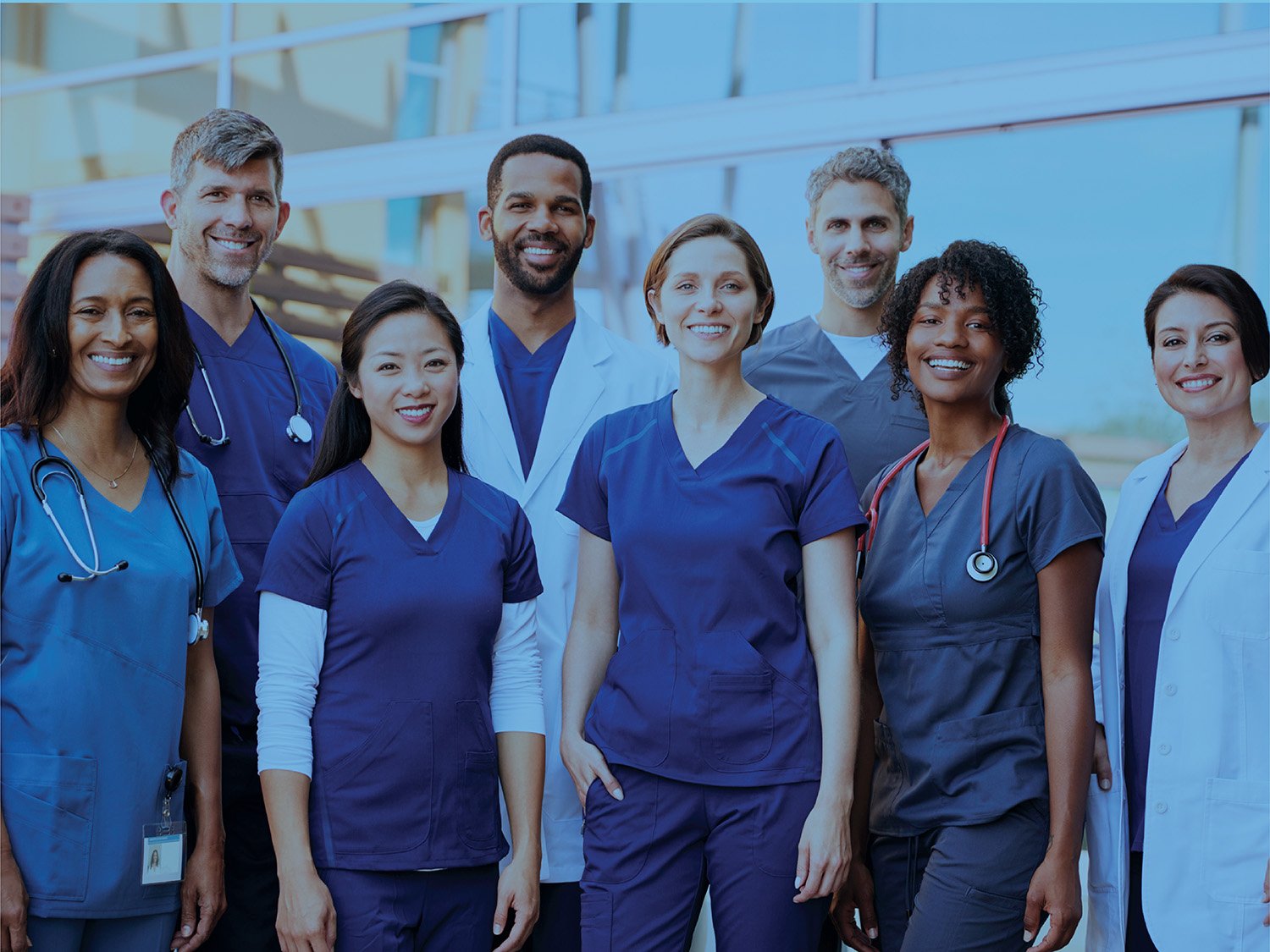 A group of physicians standing together and smiling
