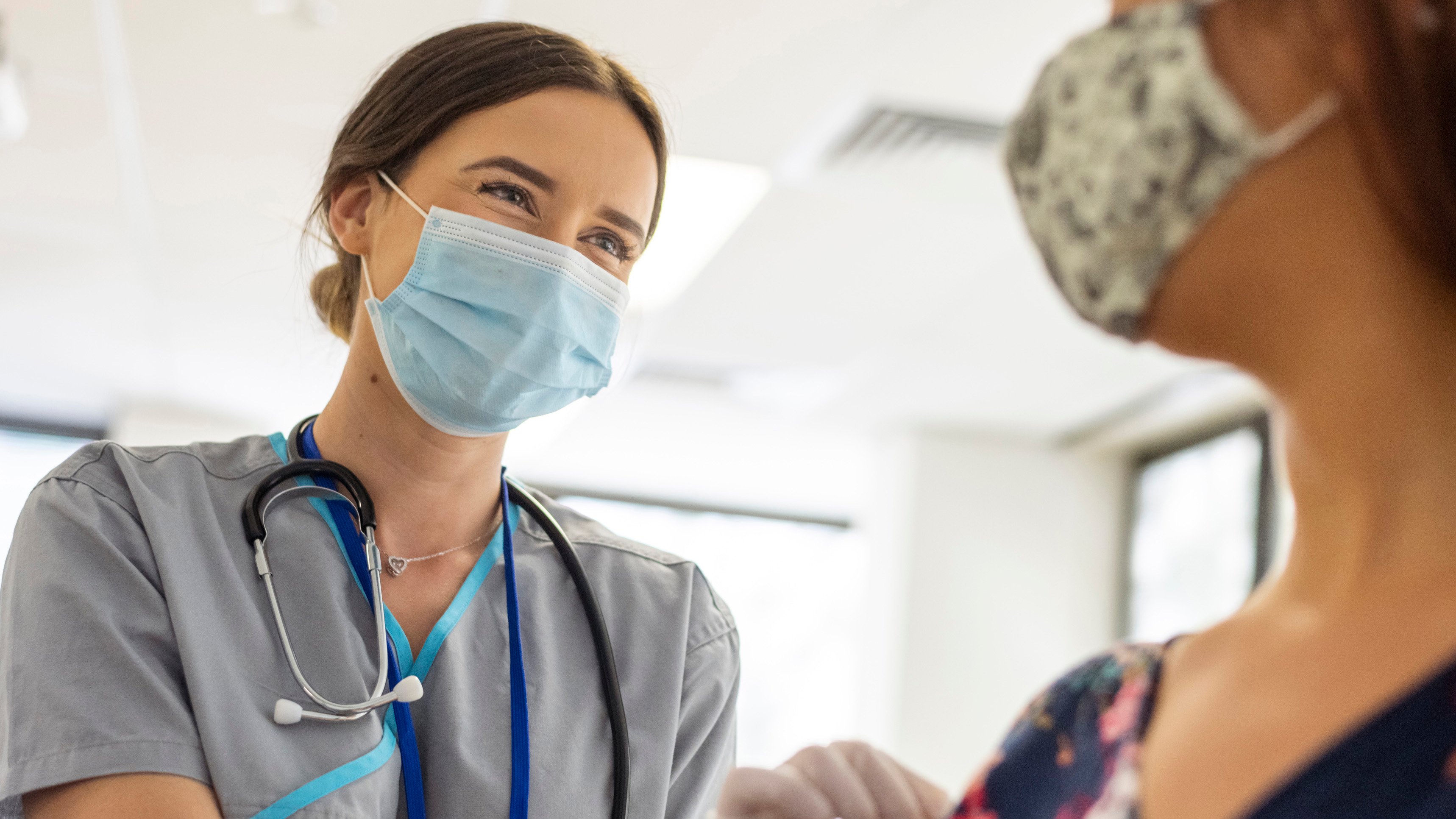 doctor giving patient vaccine