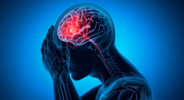 3D medical illustration of a person holding their face in pain, with a transparent view of the brain showing a bright red, inflamed area indicating a severe headache or migraine.
