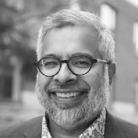 A headshot of Nouman Ashraf is seen here.