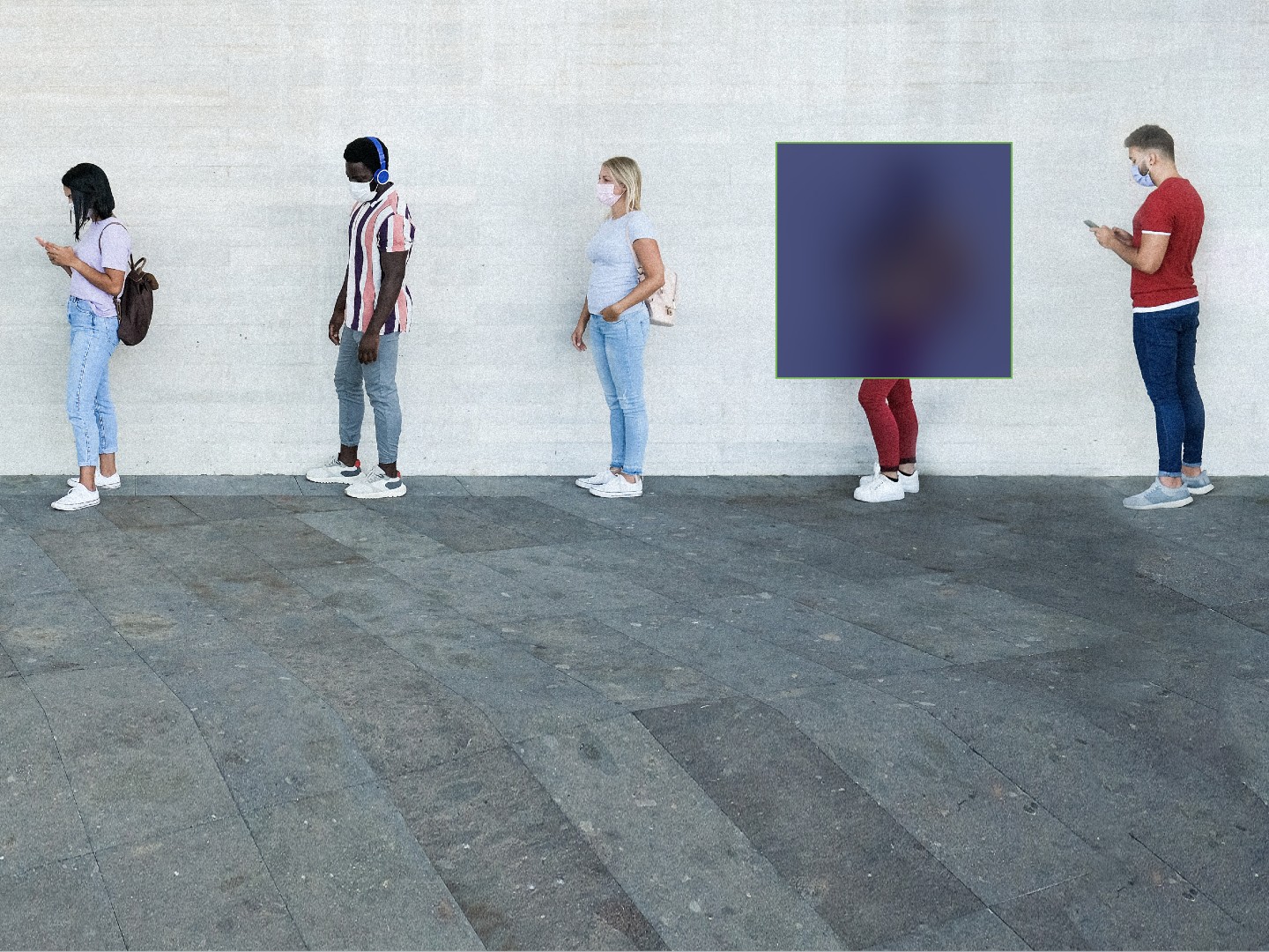Diverse group of people waiting in line with a non-transparent block covering the face and upper body of one of them.