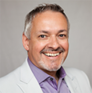 A headshot of Richard Rodrigue is seen here.