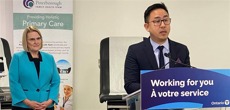 OMA President Dr. Andrew Park giving a speech standing behind a podium.
