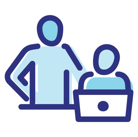 An icon of two people around a laptop.