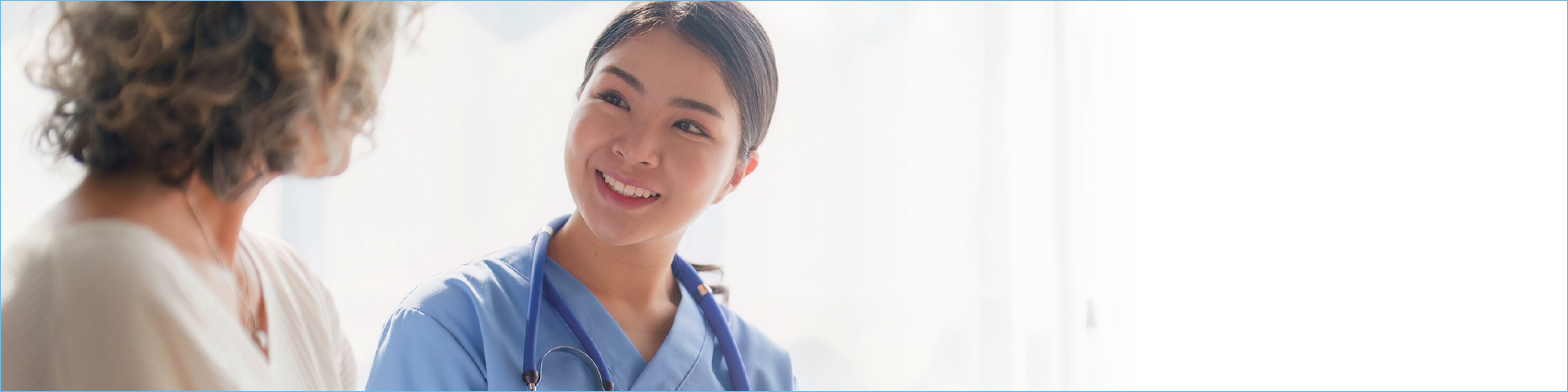 Physician speaking with a patient