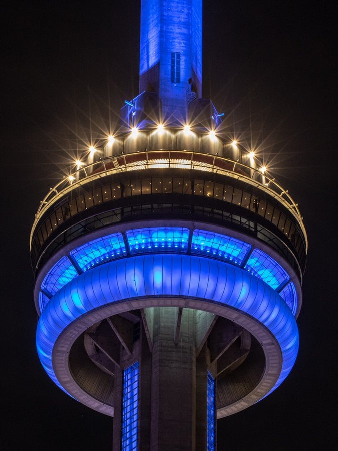 Toronto's CN Tower lit up in blue for Doctors' Day 2026.