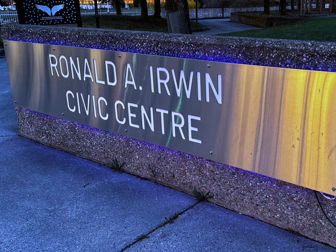 The sign for the Ronald A. Irwin Civic Centre appears in blue light