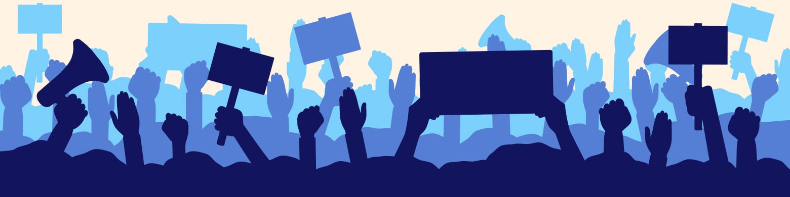 people holding signs above their head