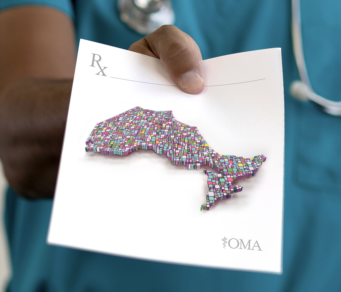 A doctor holding a prescription with an illustrated map of Ontario.