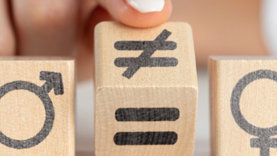 Wooden blocks with male and female gender symbols  on them 